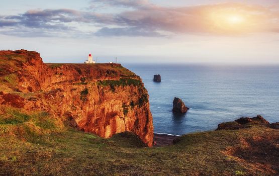 Beautiful white lighthouse at Cape Dyrholaey, South Iceland.