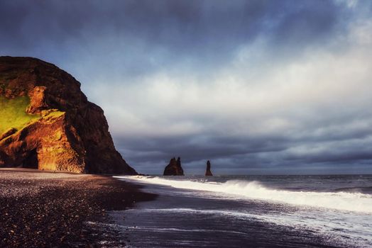 The Rock Troll Toes. Reynisdrangar cliffs. Black sand beach. Iceland
