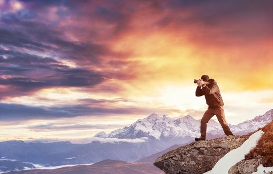 A tourist looks at the landscape. Beautiful sunset. Carpathians, Ukraine, Europe