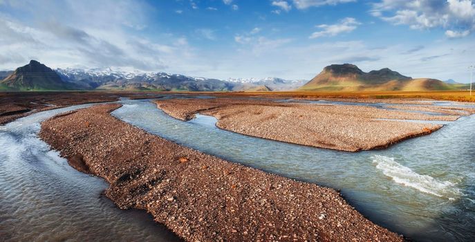 The beautiful landscape of mountains and rivers in Iceland.