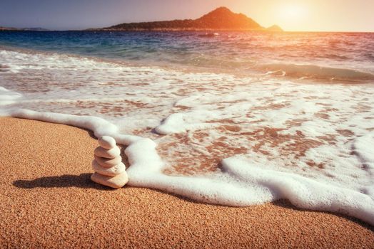 Scenic view of sandy beach and surf waves on the shore
