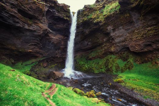 Fantastic landscape of mountains and waterfalls in Iceland.