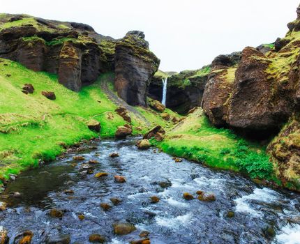 Fantastic landscape of mountains and waterfalls in Iceland.