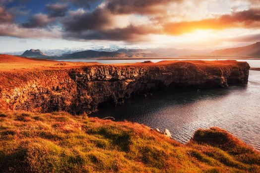 Reynisfjara black sand beach in Iceland. Reynisfyal Mountains.