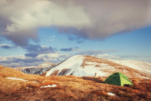 Tourist tent in the mountains in spring.