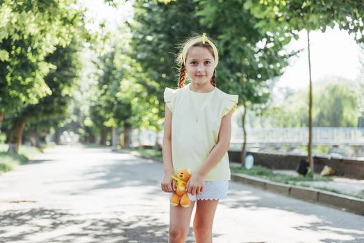 Beautiful girl in a summer sunny day.