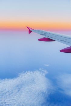 Wing aircraft and a view of cumulus clouds.