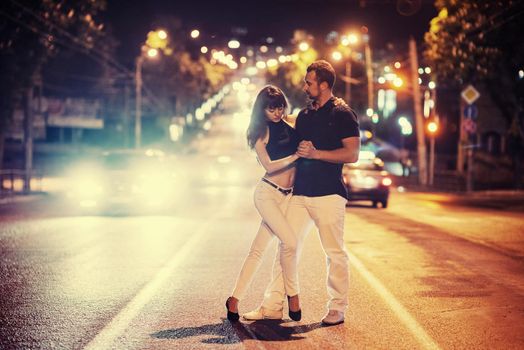 young couple dancing on the road. Ukraine. Europe