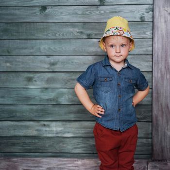 Happy little boy, child in a Panama hat.