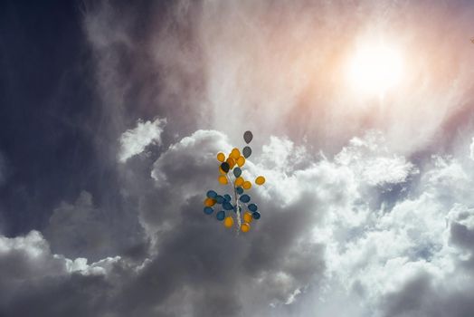 Flying in the sky yellow - blue balls.