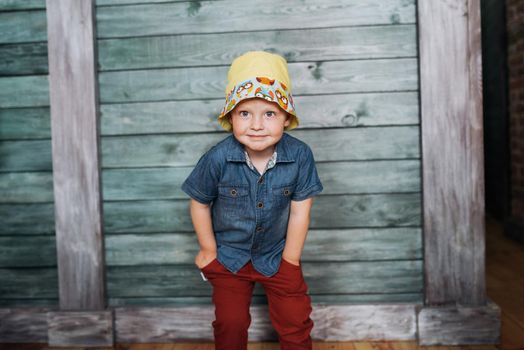 Happy little boy, child in a Panama hat.