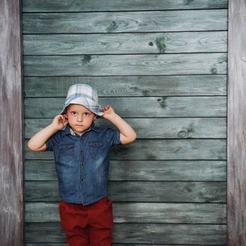 Happy little boy, child in a Panama hat.
