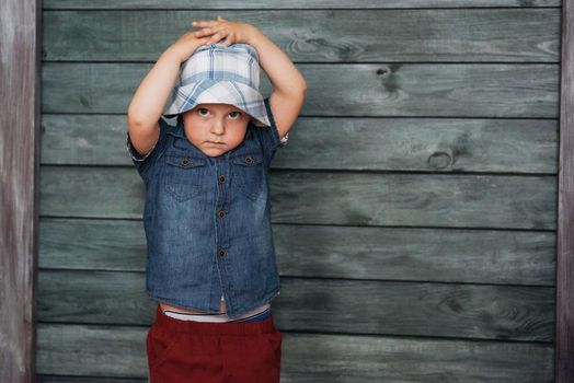 Happy little boy, child in a Panama hat.