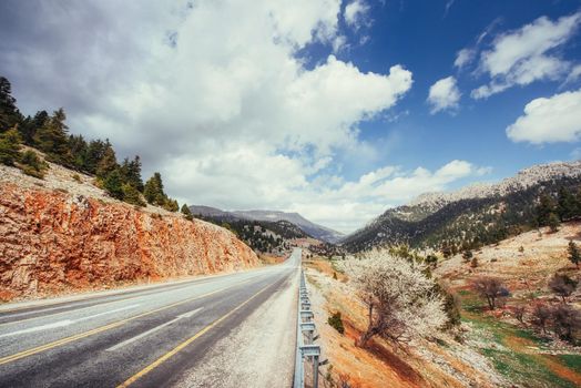 View of a beautiful asphalt road that video to the mountains.