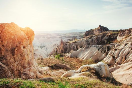 Fantastic sunrise over the Red Valley in Cappadocia, Anatolia, Turkey. Volcanic mountains in Goreme National Park.