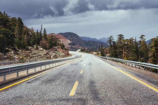 View of a beautiful asphalt road that video to the mountains.