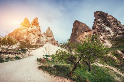 Review unique geological formations in Cappadocia, Turkey. Kappadokiets region, with its valleys, gorges, hills, located between the volcanic mountains in Goreme National Park.