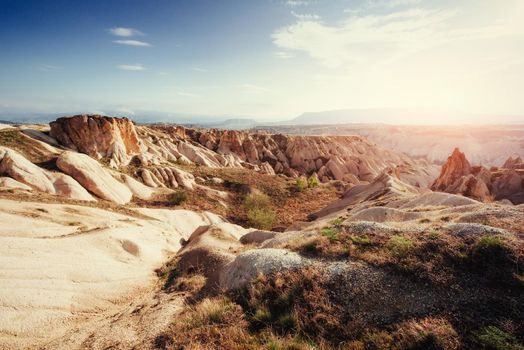 Fantastic sunrise over the Red Valley in Cappadocia, Anatolia, Turkey. Volcanic mountains in Goreme National Park.