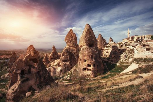 Review unique geological formations in Cappadocia, Turkey. Kappadokiets region, with its valleys, gorges, hills, located between the volcanic mountains in Goreme National Park.