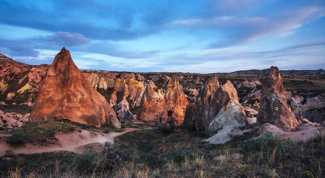 TUnique geological formations in valley in Cappadocia.