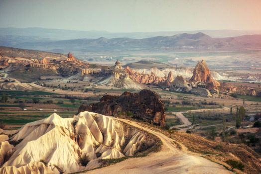 TUnique geological formations in valley in Cappadocia.
