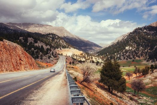 beautiful scenic highway in mountains. Car rides on asphalt surfaces