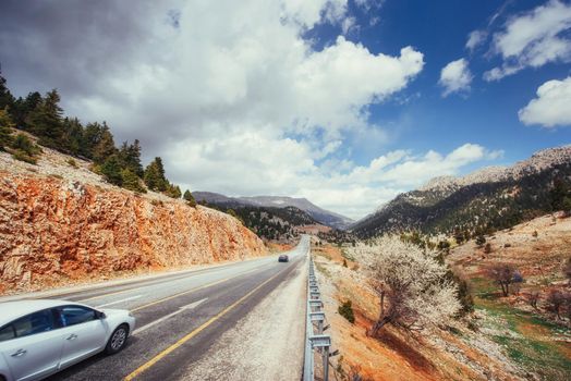 beautiful scenic highway in mountains. Car rides on asphalt surfaces