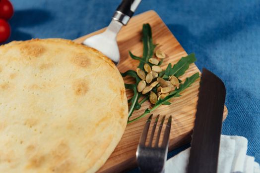 Traditional Greek spinach pie with puff pastry.