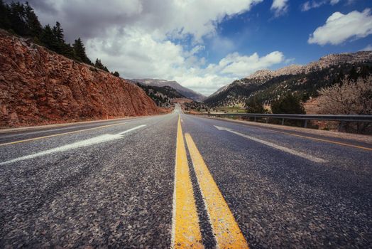 View of a beautiful asphalt road that video to the mountains.