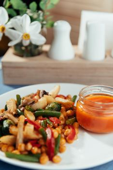 steamed vegetables a mushrooms and sauce. Advertising shooting menu