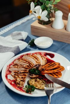 Grilled vegetables and chicken fillet. Traditional cuisine. Grill kitchen.