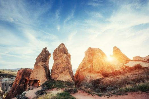 Fantastic sunrise over the Red Valley in Cappadocia, Anatolia, Turkey. Volcanic mountains in Goreme National Park.