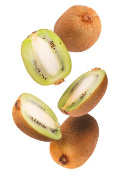 Creative concept with flying kiwi fruit. Sliced kiwi isolated on white background. Levity fruit floating in the air