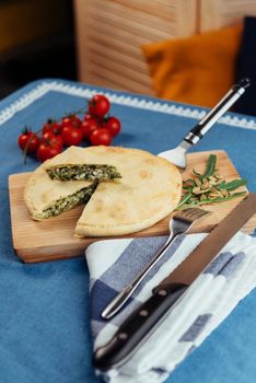 Traditional Greek spinach pie with puff pastry.