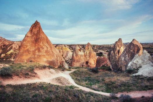 TUnique geological formations in valley in Cappadocia.