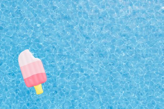 From above of 3D rendering background of striped inflatable ice cream floating in blue water of outdoor swimming pool on summer day