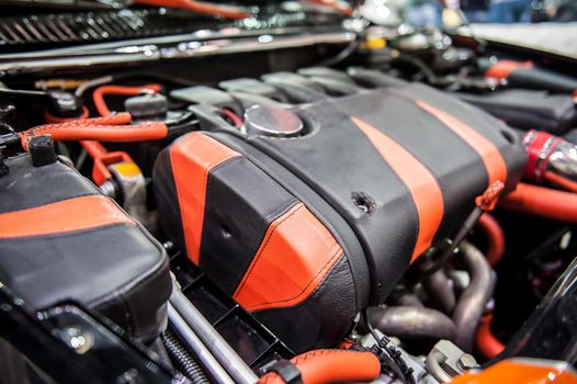 Close up of a red and black modern custom engine