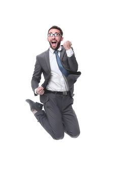 in full growth. happy young businessman. isolated on white background.