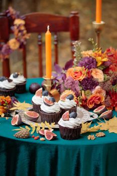 Autumn sweet dessert decorated on a table in the park