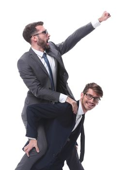 happy businessman carrying his colleague on the piggyback . isolated on white background