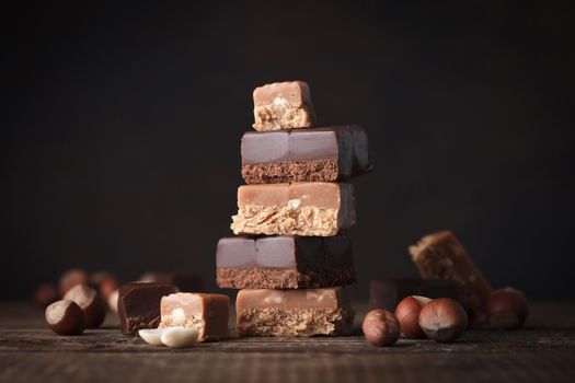 Chocolate and caramel toffee on a dark background