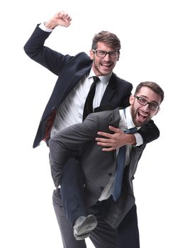 smiling businessman sitting on the back of his colleague . isolated on white background.