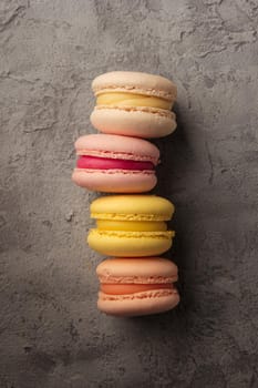 Colorful pink macaroons on a table top view
