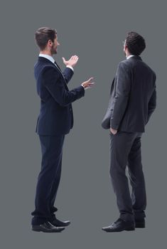 rear view. two businessmen looking at copy space. isolated on white background.