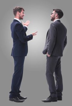 rear view. two businessmen looking at copy space. isolated on white background.