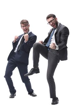 in full growth. two very happy young businessmen . isolated on white background.