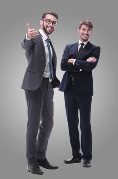 in full growth. two businessmen standing together. isolated on white background.