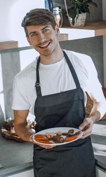 attractive young man with Breakfast for his girlfriend . photo with copy space