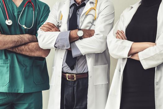 Healthcare people group. Professional doctor working in hospital office or clinic with other doctors, nurse and surgeon. Medical technology research institute and doctor staff service concept.