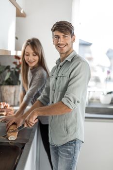 modern young couple enjoys cooking Breakfast together.